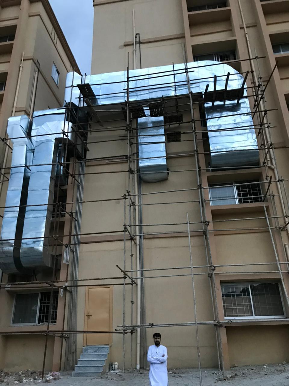 GI square duct run on elevated steel supports