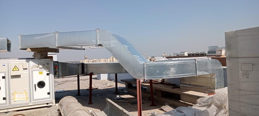 Insulated flexible duct above false ceiling